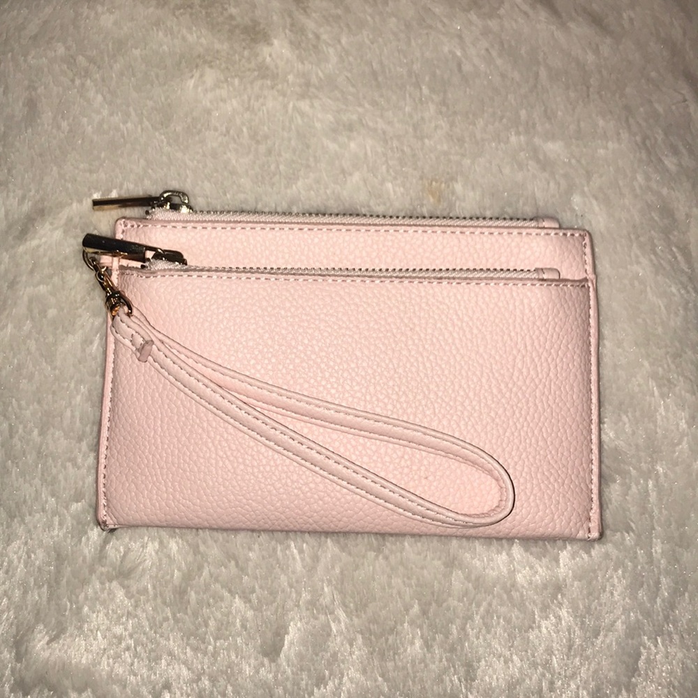 A New Day light pink wristlet